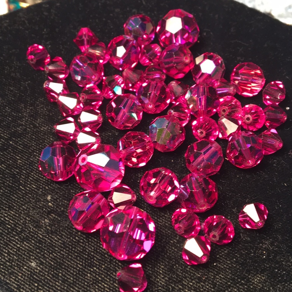 Various shapes and sizes of pink crystals